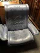A Stressless blue leather adjustable reclining armchair.