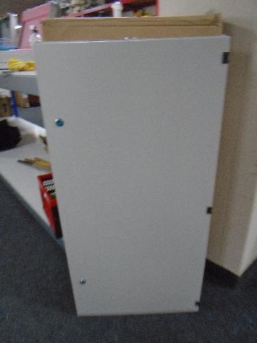 Two wall mountable metal cabinets with keys.