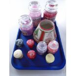 A tray of Yankee candles and candle shade