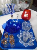 A tray of coloured glass,