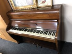 A mahogany cased overstrung piano by Challen (width 134cm).
