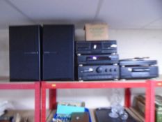 A Kenwood five piece stack system with speakers together with a box containing leads and remote.