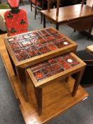A nest of two mid century Danish tiled tables