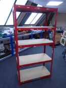 A five tier red metal shelving unit.