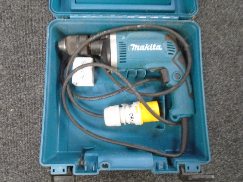 A Makita 110v drill in case