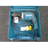 A Makita 110v drill in case