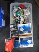 A box containing socket covers, lightbulbs, LED scoop lights, door closing bracket etc.