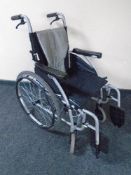 A folding lightweight wheelchair