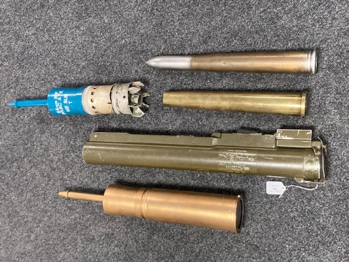 An Anti tank 66mm Heat L1A1 rocket propelled grenade launcher tube, together with various shells,