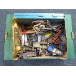 A box of tools including woodworking planes etc.