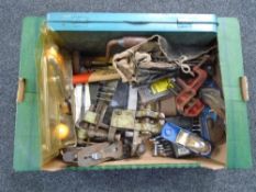 A box of tools including woodworking planes etc.