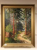 Continental school : Path between tall trees, oil-on-canvas, in gilt frame, 64cm by 48cm.