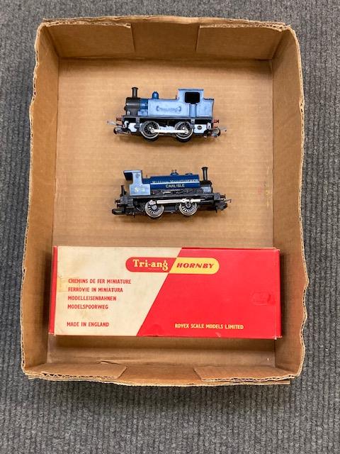 Three Hornby locomotive engines, together with further Hornby track, boxed level crossing etc.