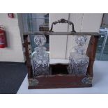 A mahogany and silver plated tantalus with two decanters no key CONDITION REPORT: