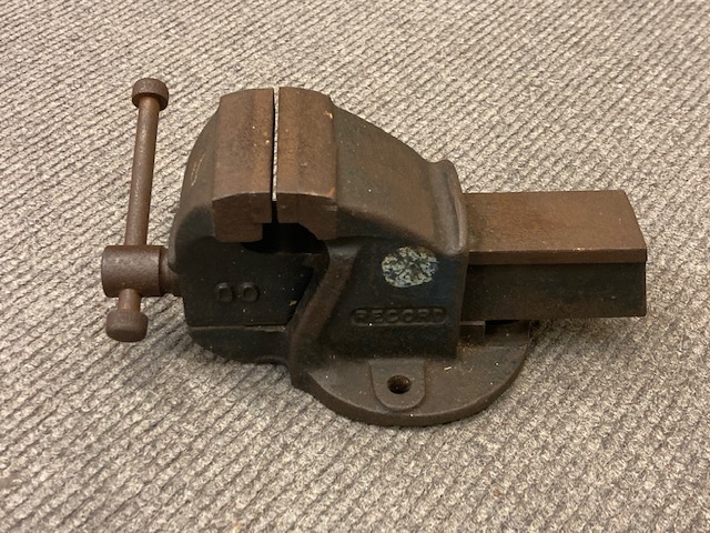 A large Record clamp 52 1/2 E, together with a further 00 size Record clamp.