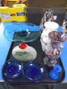 A tray of glass items including an Oriental bottle vase with lid, coloured art glass etc.
