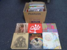 A box containing vinyl records including Little Richard, La Granja, Goldie, Lynyrd Skynyrd,