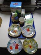 A tray containing Rupert the Bear ceramics including a set of eight Hamilton collection plates with