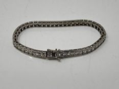 A Sterling silver line bracelet set with moissanite