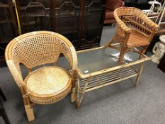 A bamboo and wicker armchair together with a child's wicker armchair and a bamboo and wicker glass