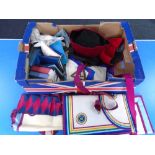 A box containing Masonic items including gloves, books etc.