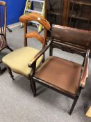 A 19th century mahogany dining chair together with a further armchair.