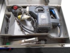 An Elu 110v hammer drill with accessories, in case.