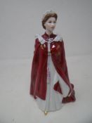 A Royal Worcester china figure celebrating the Queen's 80th birthday, 2006.