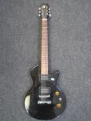 A copy of an Epiphone Special model electric guitar