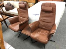 A pair of 20th century Danish BD Mobel furniture brown leather high backed armchairs with head