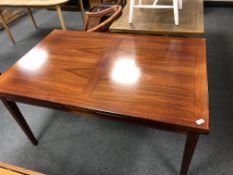 A Skovby furniture extending dining table,