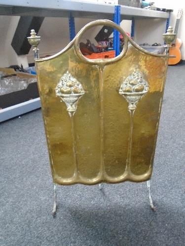 A brass art nouveau fire screen