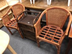 A pair of bamboo and wicker armchairs together with a further three drawer chest