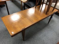 A mid 20th century teak coffee table length 160 cm, width 60 cm height 50.5 cm.