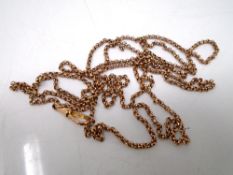 A gold plated muff chain