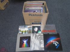 A box containing vinyl records including Elbow, Bob Dylan, Marvin Gaye, Deep Purple, Kiss,
