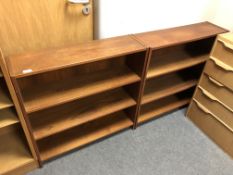 A pair of Danish teak veneered open bookcases, width 79.