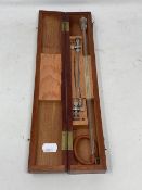 An early 20th century mahogany aspiration needle set in case