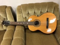 A Musima classical acoustic guitar