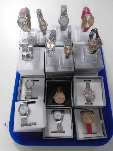 A collection of lady's and gent's designer wristwatches