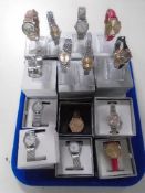 A collection of lady's and gent's designer wristwatches