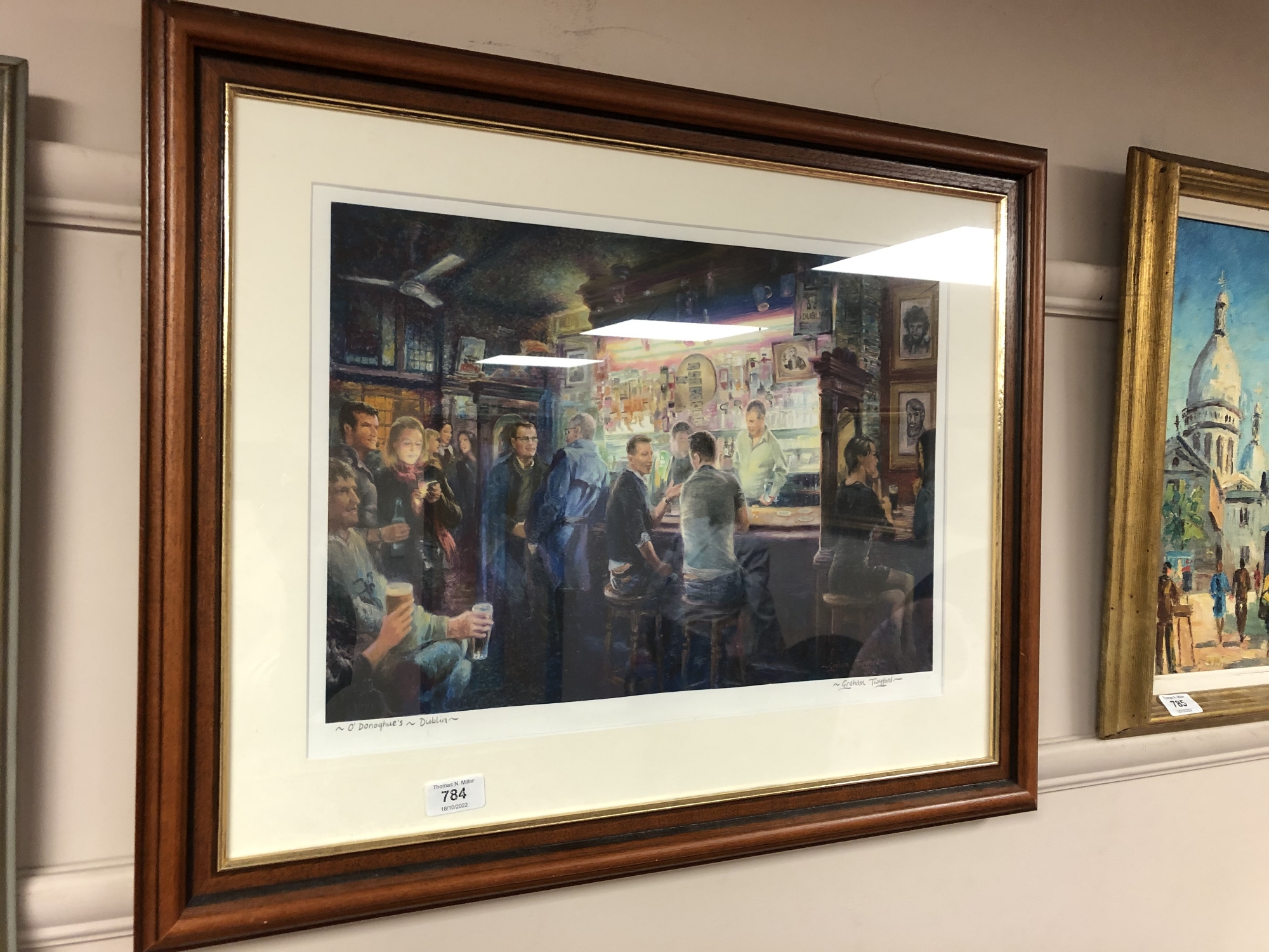 A colour print after Graham Twyford : O'Donoghue's Dublin, signed in pencil, 48cm by 35cm.