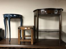 A regency style two tier serpentine fronted hall table together with a sheesham wood stool and a