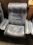 A Stressless blue leather adjustable reclining armchair.