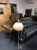 A 1970s chrome mushroom adjustable floor lamp.