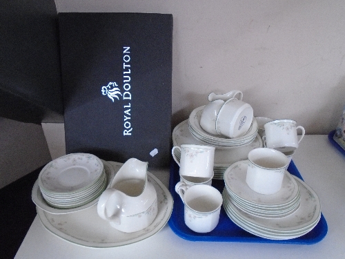 A quantity of Royal Doulton Caprice coffee and dinner ware,