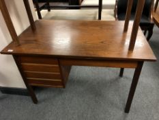 A mid century Danish teak single pedestal desk,