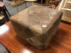 A 20th century leather patchwork pouffe