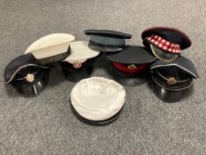 A collection of military and other caps (q)