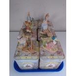 Six Border Fine Arts Beatrix Potter figures in tins